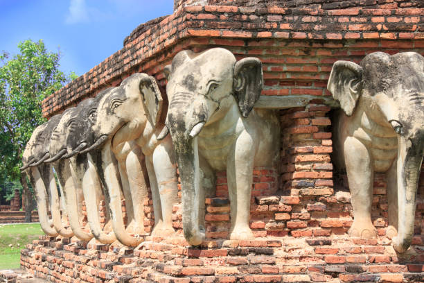istock Elephants surrounded pagoda Wat Sorasak temple in Sukhothai 1082255540