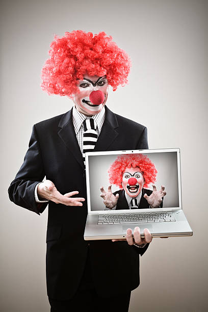 business clown - clown laptop bizarre men foto e immagini stock