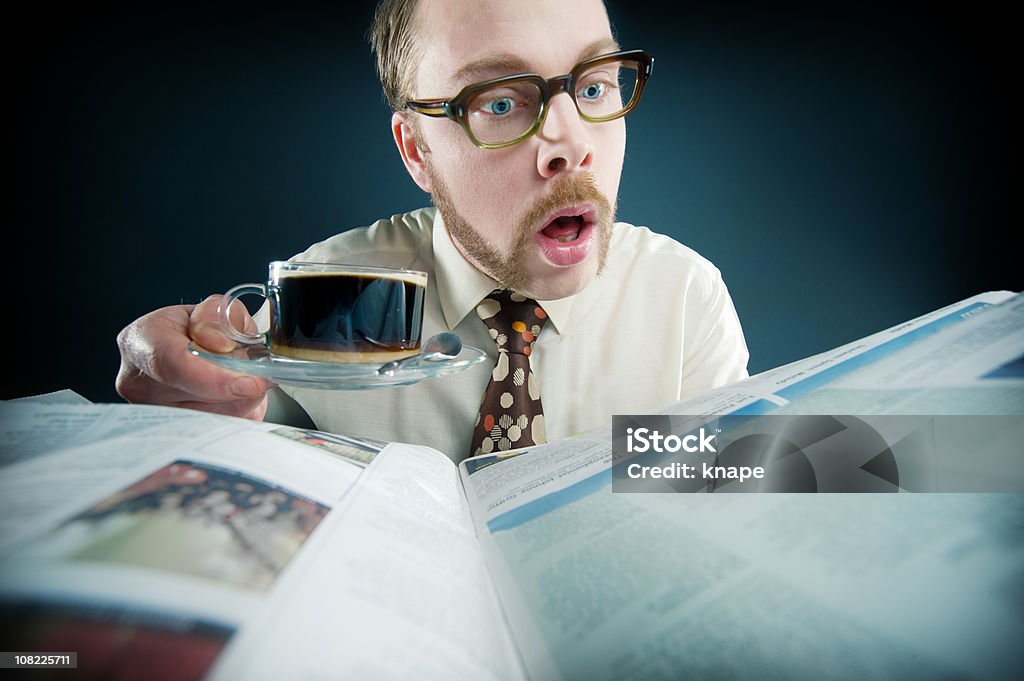 Retro man reading his newspaper  Newspaper Stock Photo