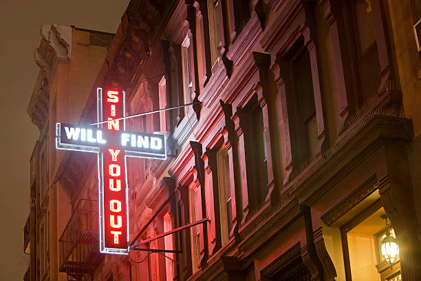 istock Cross Neon Sign at Night Sin Will Find You Out 108225736
