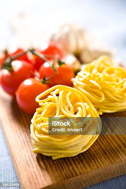 Fresh Spaghetti Noodles Stock Photo - Download Image Now - Cherry Tomato, Close-up, Color Image