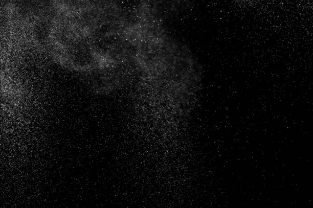 istock abstract splashes of water on a black background. 1082262378