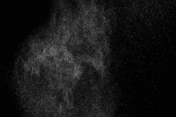 istock abstract splashes of water on a black background. 1082262388