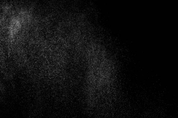 istock abstract splashes of water on a black background. 1082262396