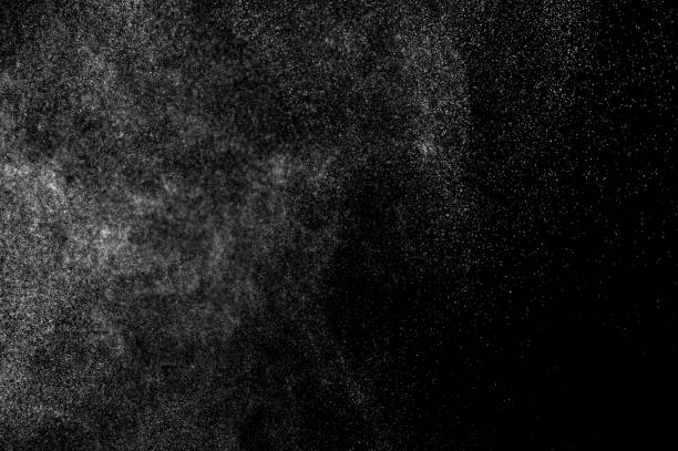 istock abstract splashes of water on a black background. 1082262408
