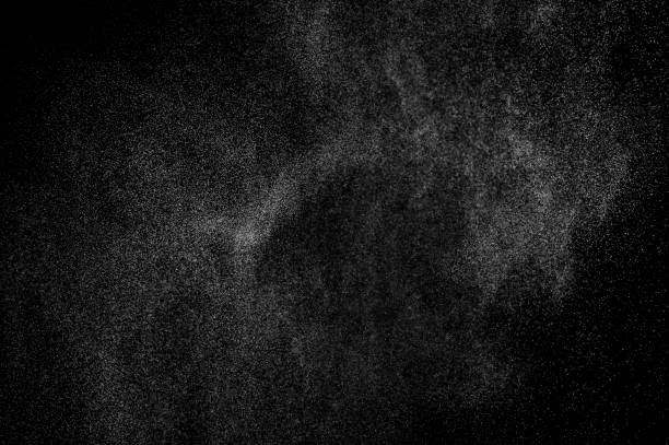istock abstract splashes of water on a black background. 1082262412