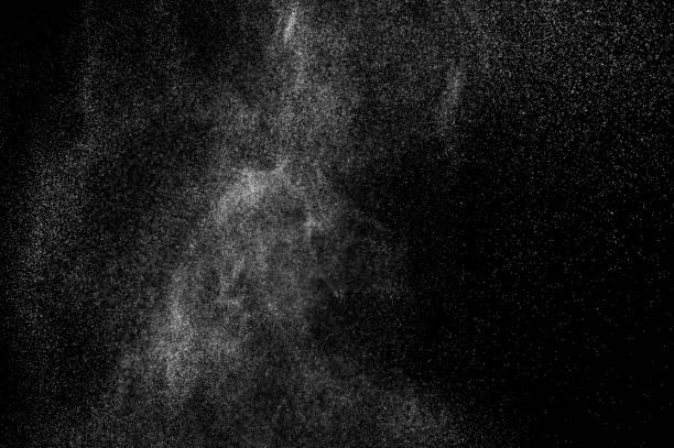 istock abstract splashes of water on a black background. 1082262422