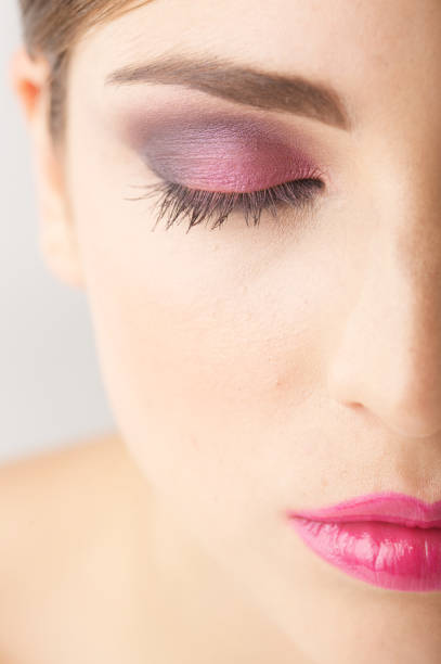 istock Half of Woman's Face with Closed Eye Wearing Make-up 108226474