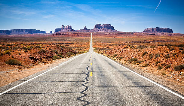 istock Landscape of highway leading forward into Monument Valley 108226552