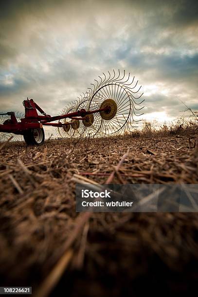 Stormy Farm Equipment Stock Photo - Download Image Now - Machinery, Threshing, Agricultural Equipment