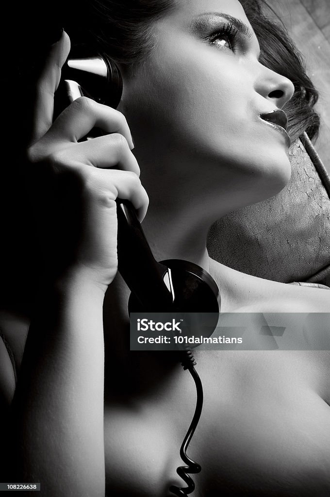 Call me Woman in profile with telephone Adult Stock Photo