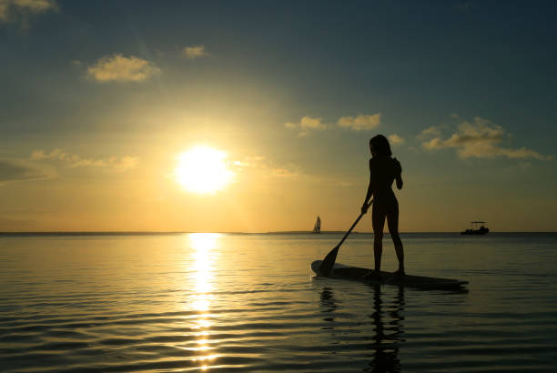 istock Happy woman relaxes on beach 1082267382