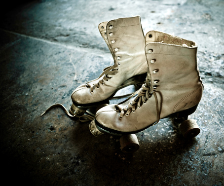 old roller skating shoes