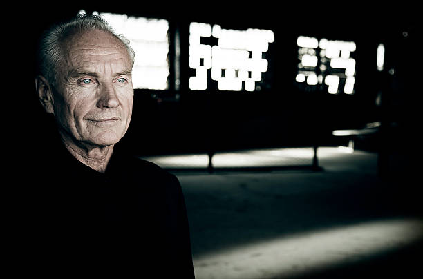 istock Senior man Sitting in Urban Setting 108227001