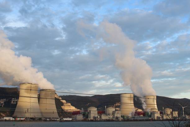 istock NUCLEAR POWER PLANT AND COOLING TOWERS 1082277754