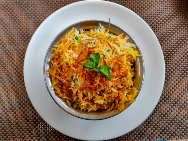 istock Dum Biryani served in a steel pot. Top view 1082284628