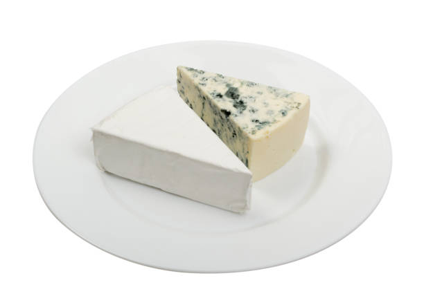 istock Piece of Blue Cheese and White Cheese on Plate Isolated 1082289762