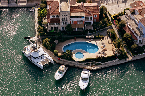 izmir, Turkey - December 6, 2018 Luxury real estate villas at the coast of Alacati Port area, shot from above in izmir.