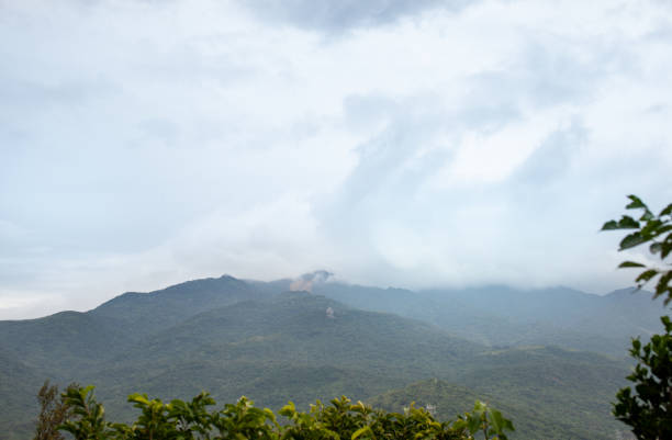 istock Mountain views in the tropical greenery in the mist 1082292720