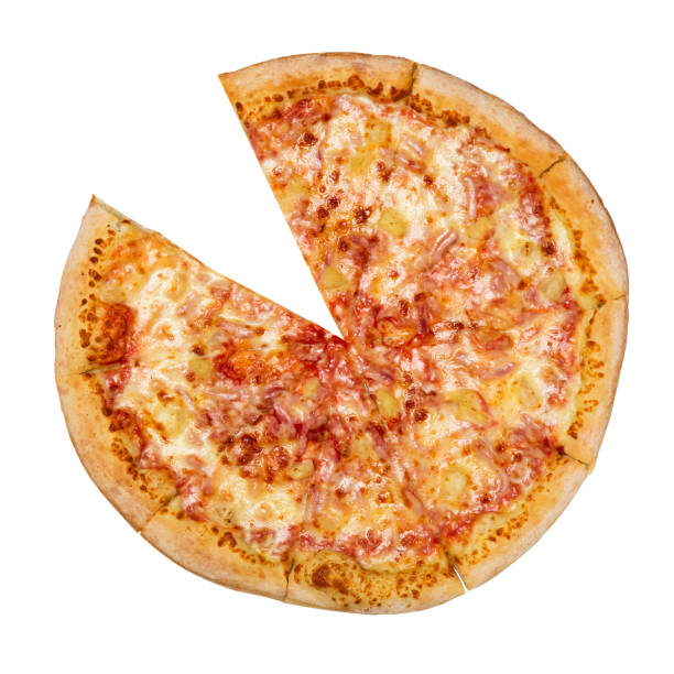 istock Hawaiian Pizza without one slice isolated on a white background. Pizza with meat, ham, pepper and pineapple. Top view. 1082299448