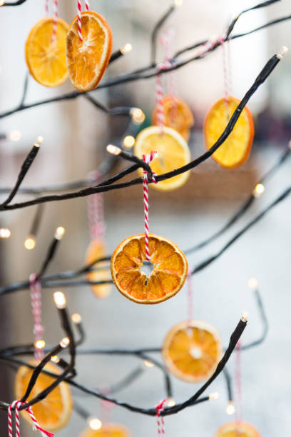 istock Orange Citrus Fruit Christmas Decoration with Christmas Lights 1082311120