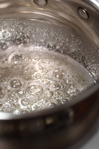 istock Simmer water and sugar mixture. Wet Caramelization. 1082313300