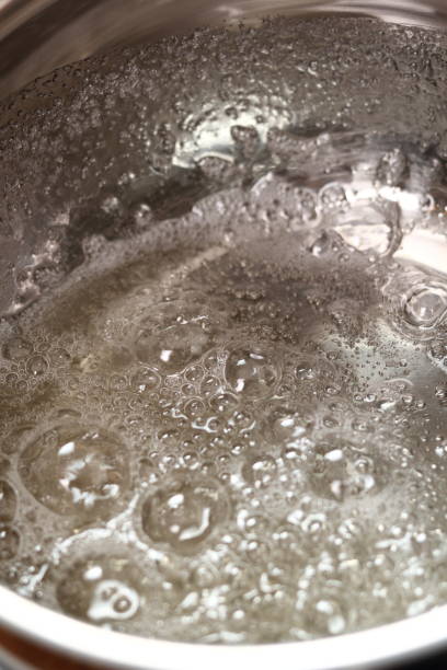 istock Boiling sugar mixture. Wet Caramelization. Making Golden Syrup Series. 1082313312