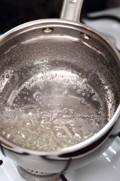 istock Simmer water and sugar mixture. Wet Caramelization. 1082313336