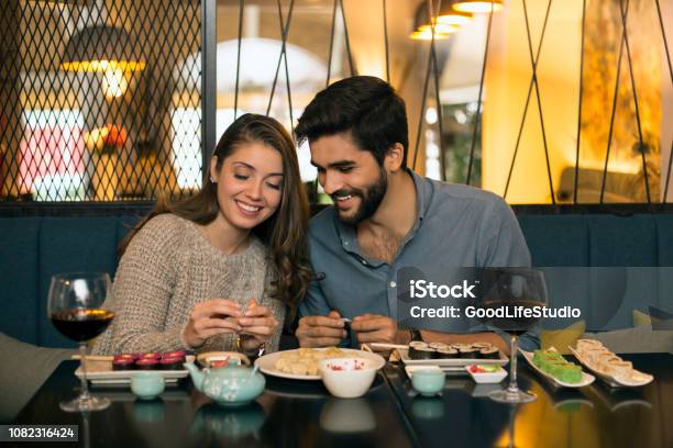 Couple In A Chinese Restaurant Stock Photo - Download Image Now - Dating, Dinner, Couple - Relationship