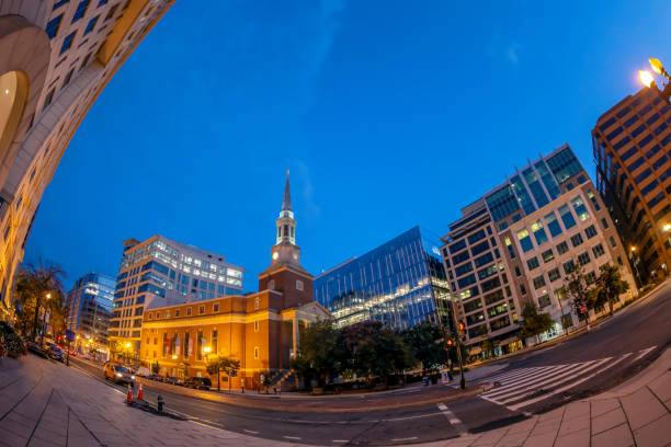 Washington DC: View at morning light of Washington DC skyscrapers, Presbyterian church and traffic on New York Avenue NW.
