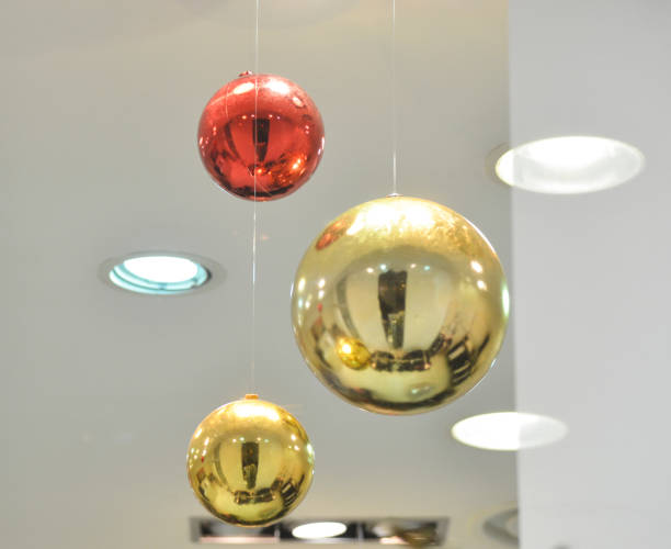 istock Three Christmas balls hanging in the white space 1082319184