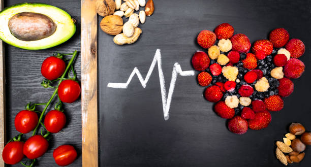 istock heart shape of various fresh berries, avocado, tomatoes, nuts 1082319710