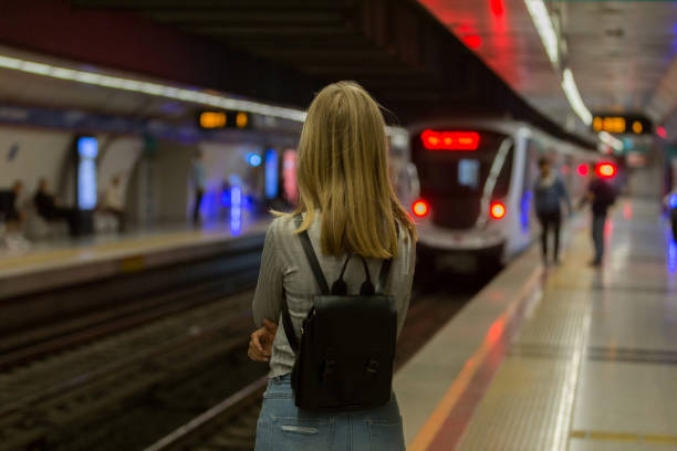 istock Young woman at the subway station 1082326186