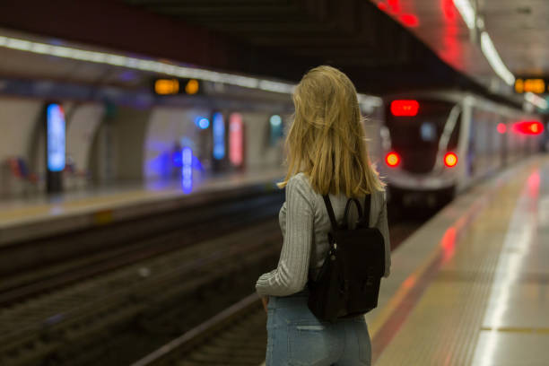 istock Young woman at the subway station 1082326316