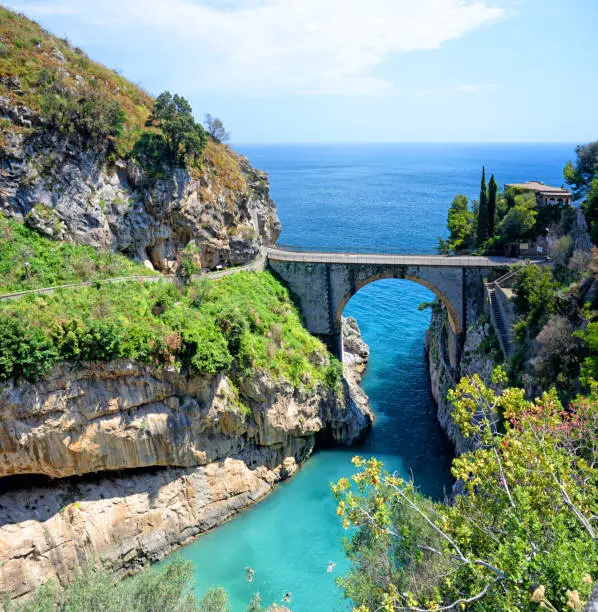 Furore fiord (Fiordo di Furore) a fascinating geological features on the Amalfi Coast, Italy. Composite photo