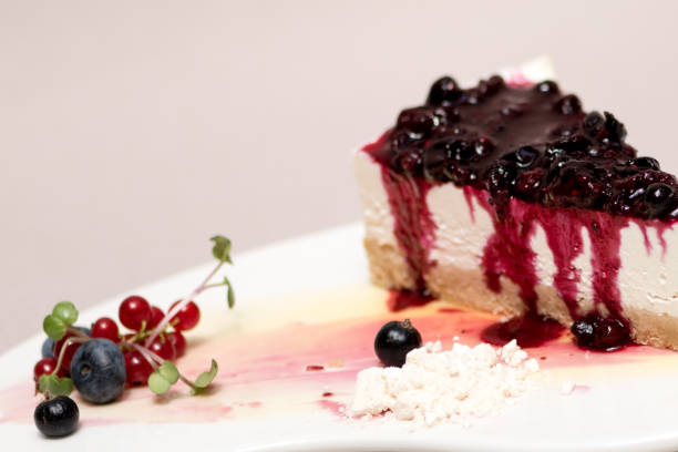 istock Fancy dessert with cheesecake and forest fruits 1082327716