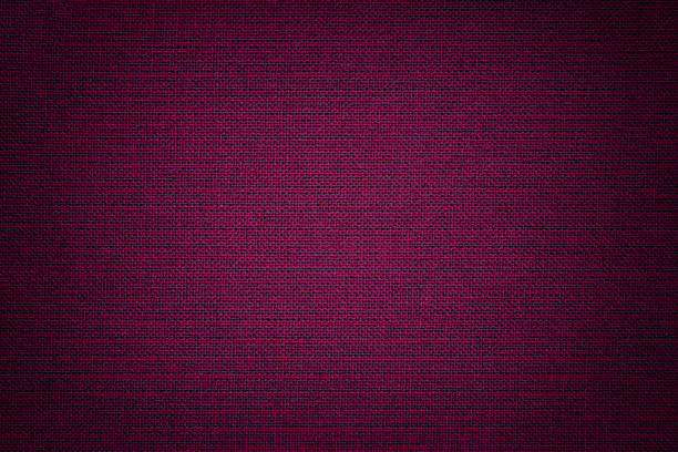 istock Dark purple background from a textile material. Fabric with natural texture. Backdrop. 1082327878