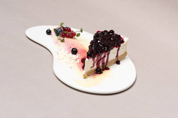 istock Fancy dessert with cheesecake and forest fruits 1082327984