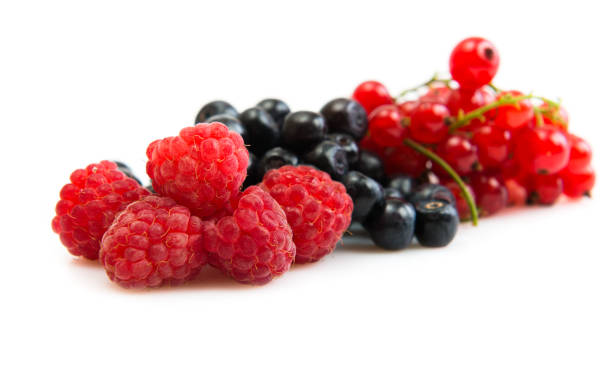 istock Mix of different berries isolated on white 1082328054