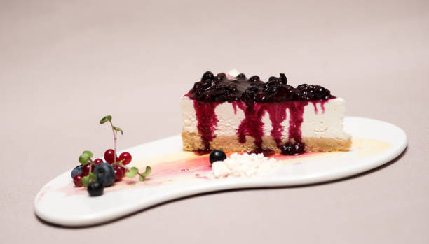 istock Fancy dessert with cheesecake and forest fruits 1082328116