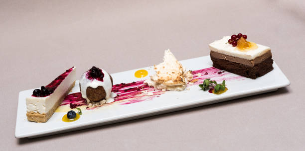 istock Different types of dessert placed on white plate 1082332228