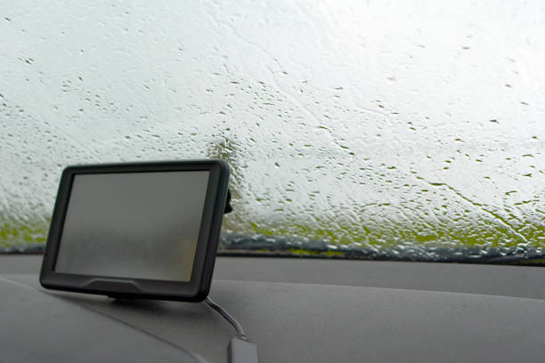 istock Car with rain on windshield in bad weather 1082340262