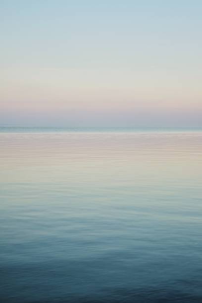 istock Blue sky landscape without clouds spreading on the sea 1082342208