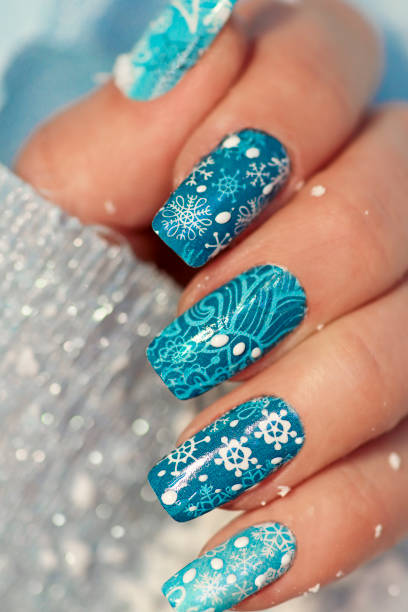 istock Winter manicure with nail stickers 1082342334