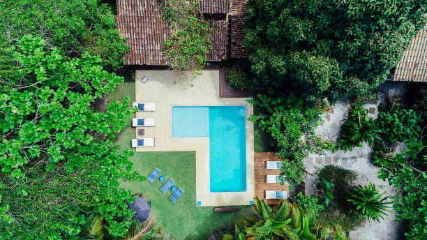 istock Overhead view of L shaped swimming pool 1082344344