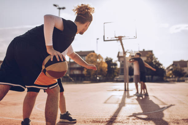 istock People playing streetball 1082353258