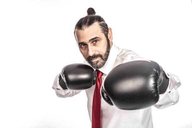 istock businessman with boxing gloves 1082353682