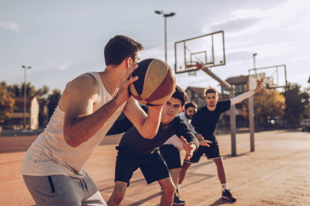 istock People playing basketball 1082353700