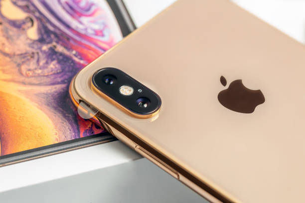 12th october,2018-kiev,ukraine: latest iphone xs on opened box on white table. newest apple smartphone on white branded box in mobile store. modern gadget with dual camera and oled screen for sale - store application software iphone mobile phone imagens e fotografias de stock