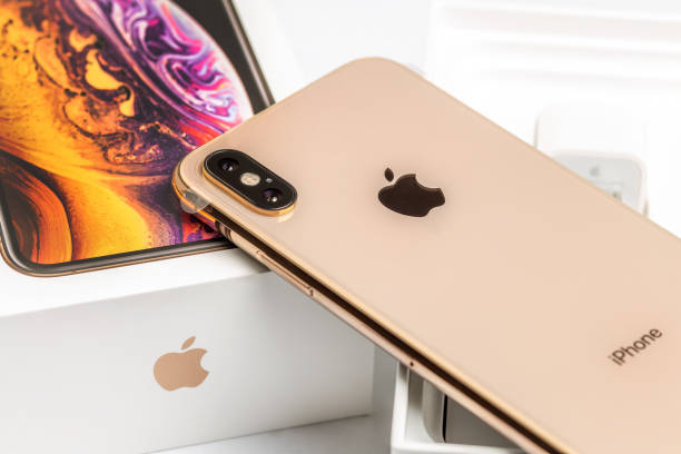 12th october,2018-kiev,ukraine: latest iphone xs on opened box on white table. newest apple smartphone on white branded box in mobile store. modern gadget with dual camera and oled screen for sale - store application software iphone mobile phone imagens e fotografias de stock